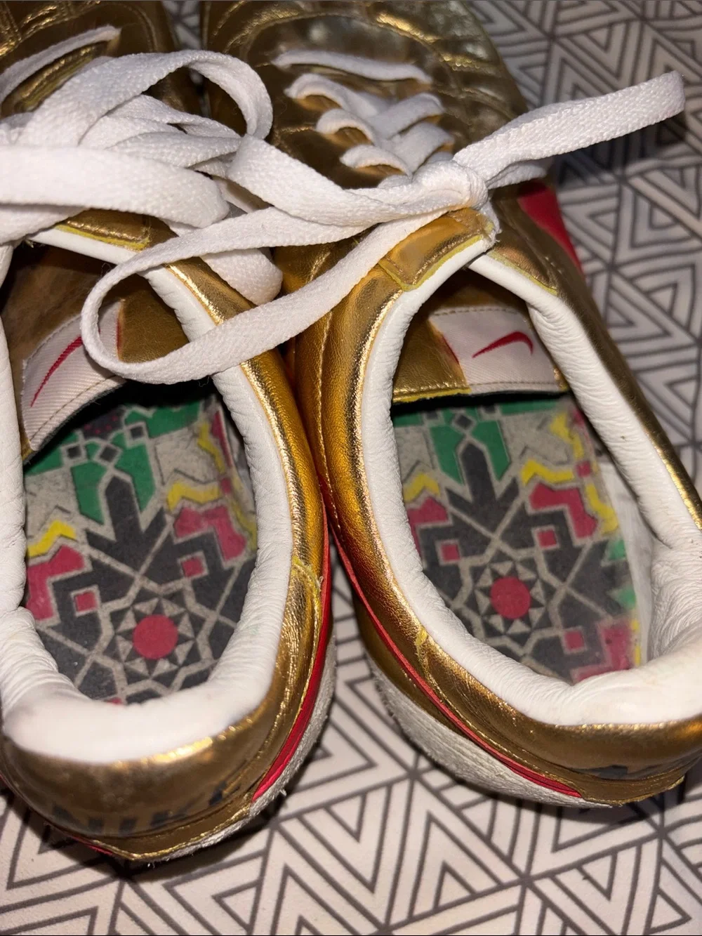 Nike Gold Leather Sneaker with Red Swoosh and White Laces